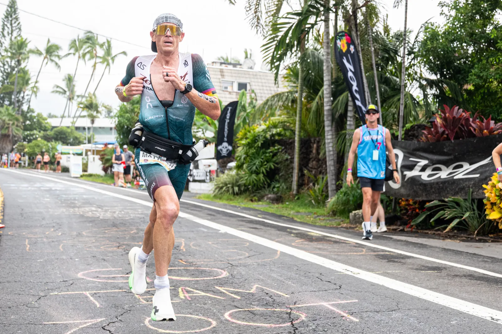 Matt Hanson running on Ali'i Drive during the marathon at the 2026 IRONMAN World Championship in Kona