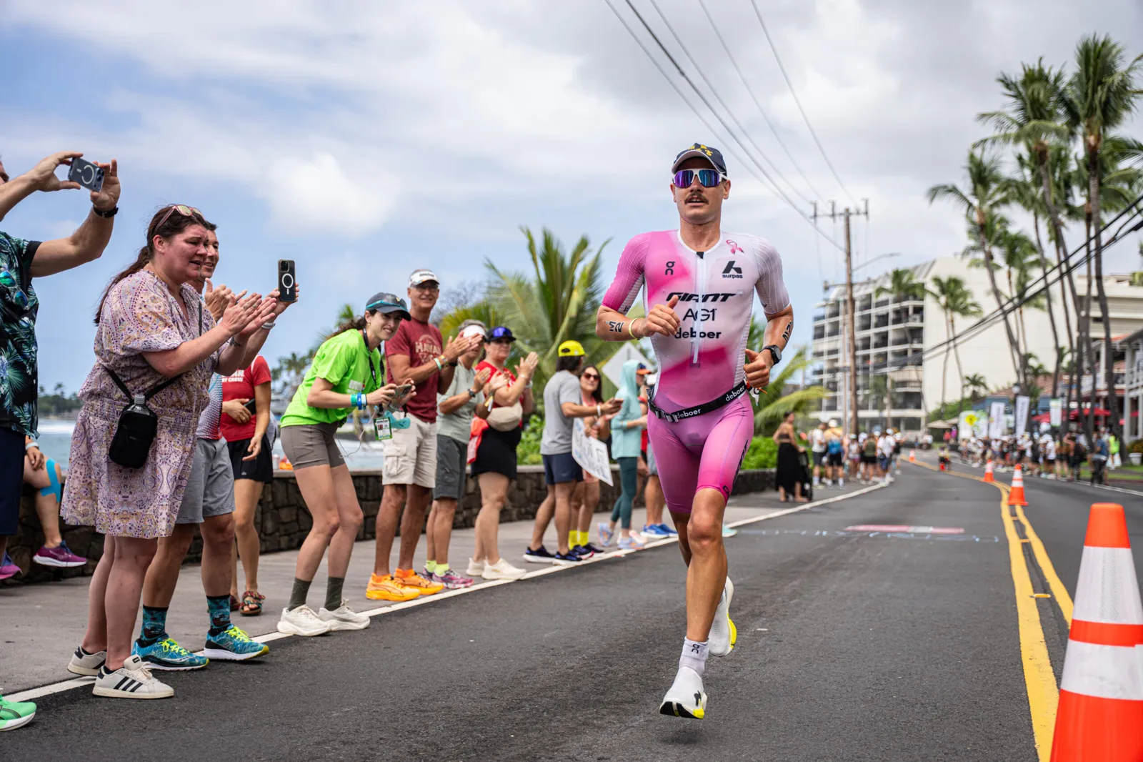Gustav Iden running on Ali'i Drive during the marathon at the 2026 IRONMAN World Championship in Kona
