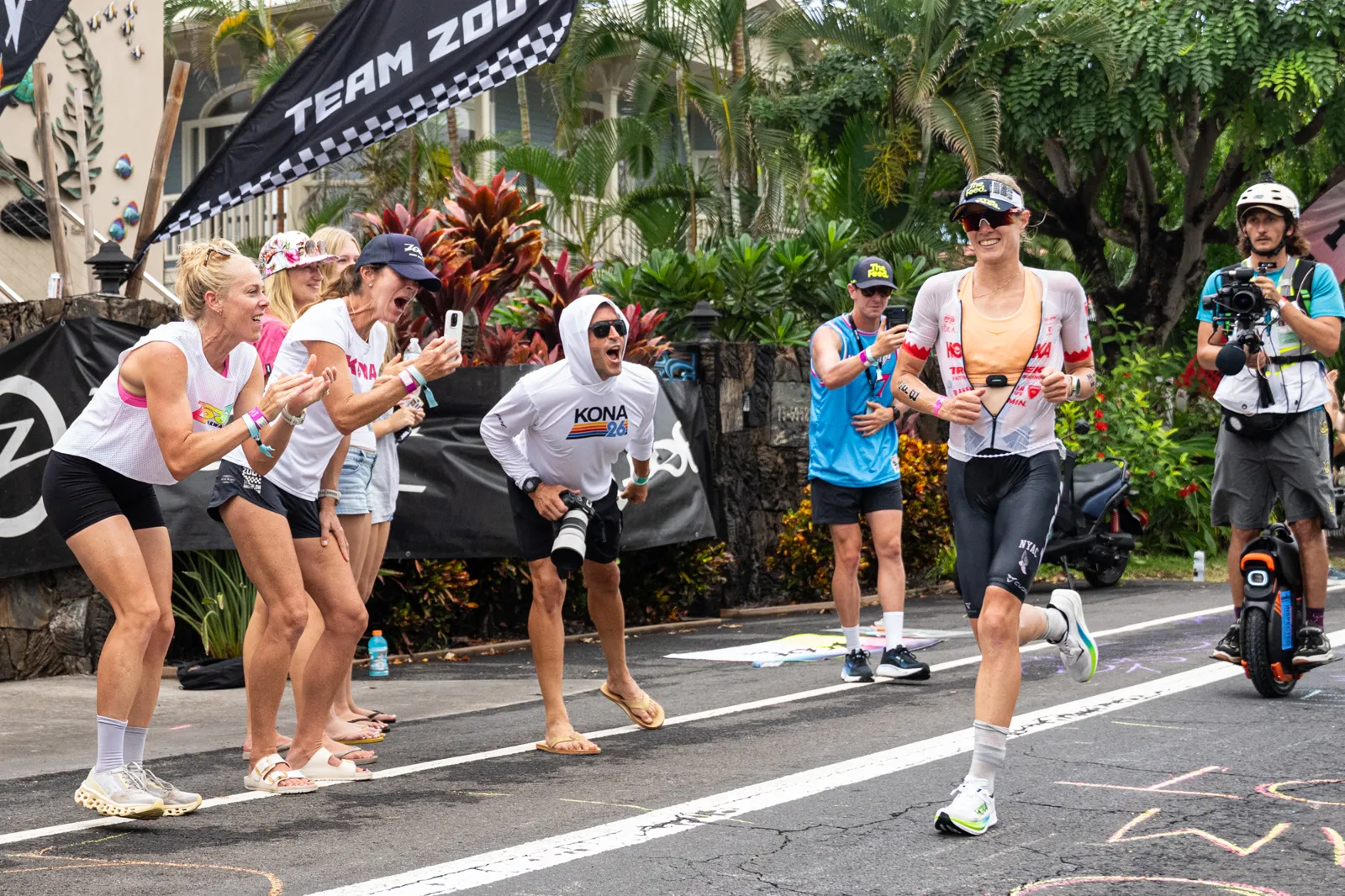 Taylor Knibb running on Ali'i Drive during the marathon at the 2026 IRONMAN World Championship in Kona