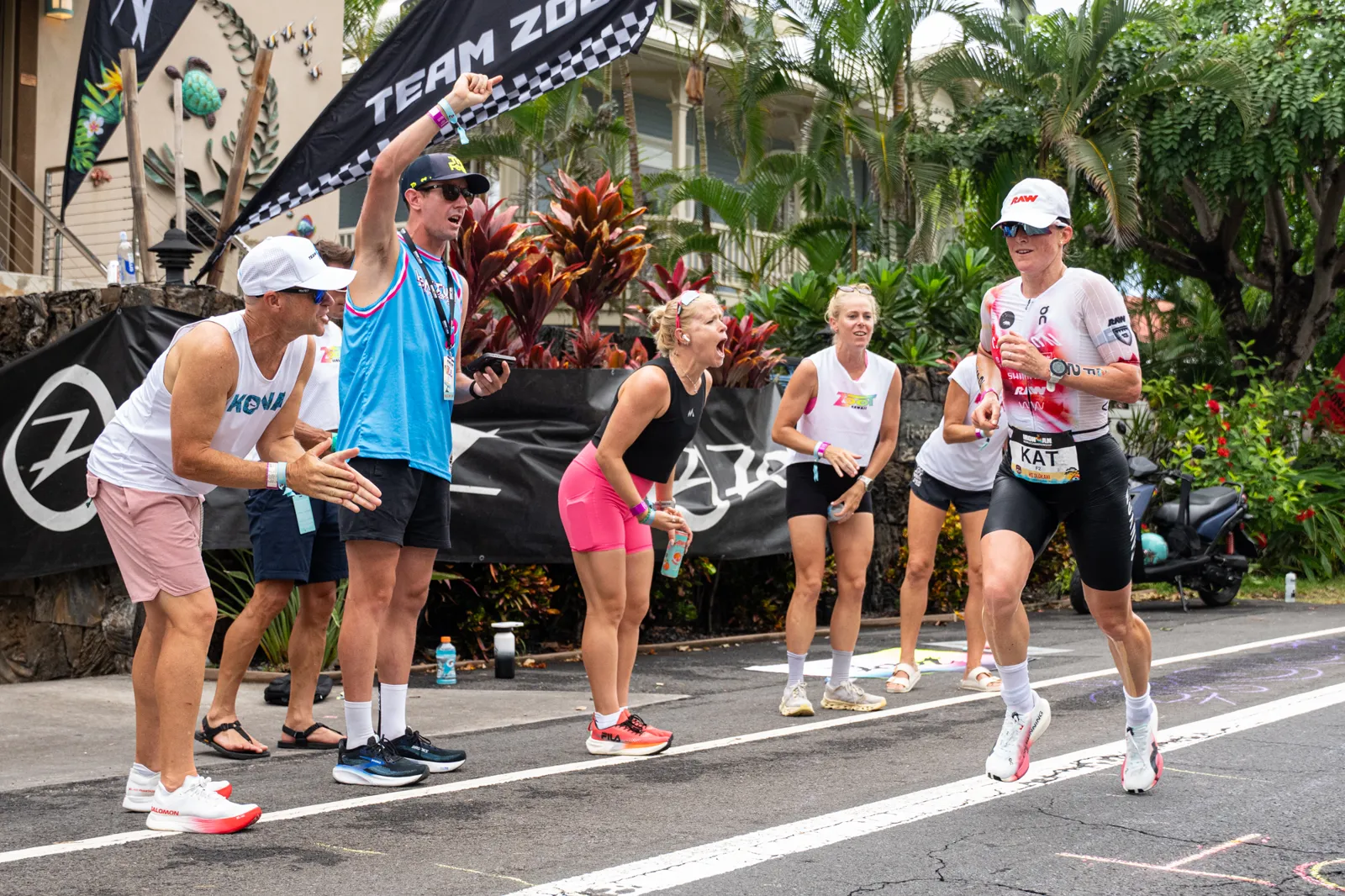 Kat Matthews running on Ali'i Drive during the marathon at the 2026 IRONMAN World Championship in Kona